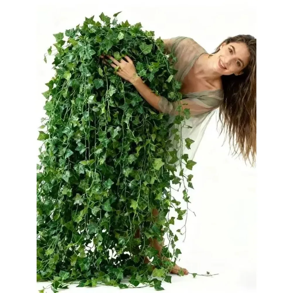 Artificial ivy garland framing a mirror over a table