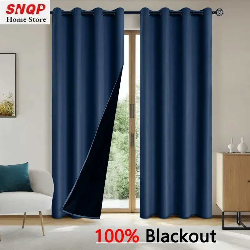 Navy blackout curtains with eyelets in a bedroom